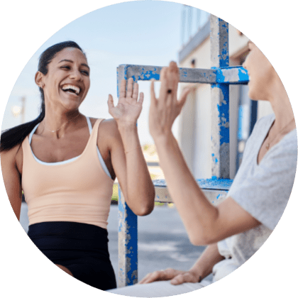 women giving high five