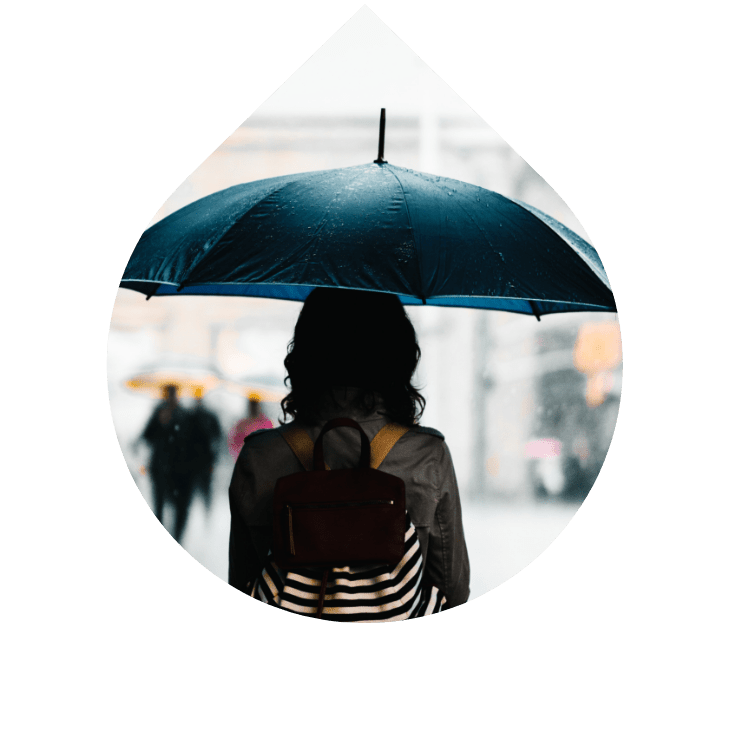 woman under umbrella in rain